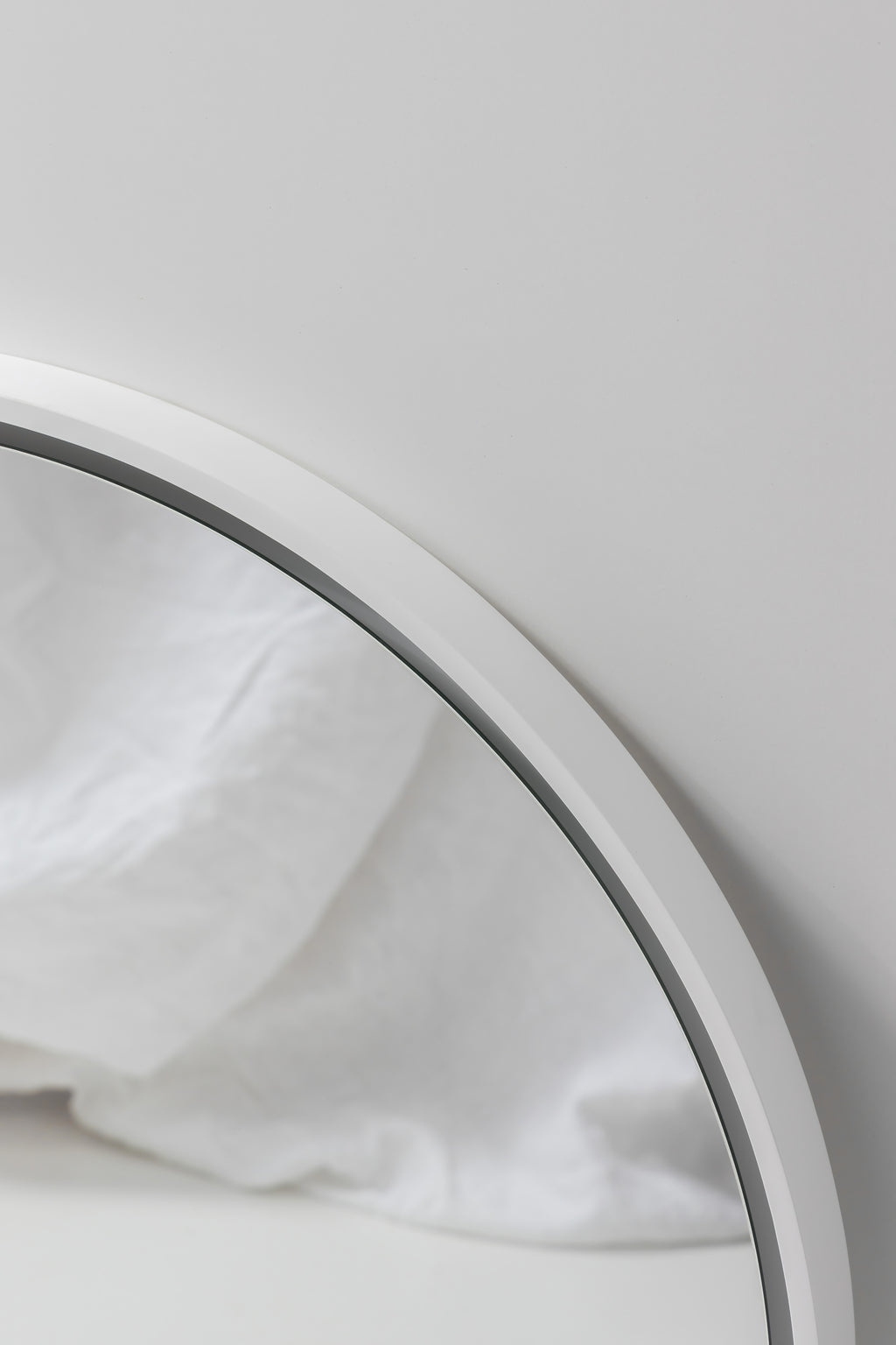 Puglia Round Mirror with Matte White Stone Frame and LED Light